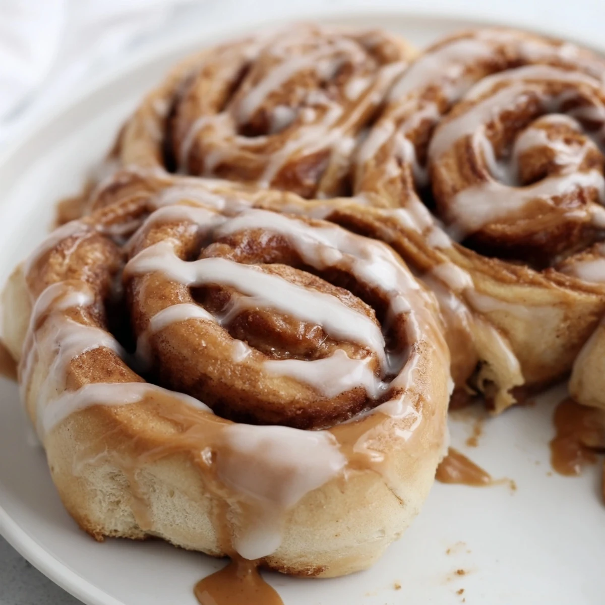 Freshly baked Soft and Gooey Biscoff Cinnamon Rolls with swirls of spiced filling, perfect for brunch or dessert.