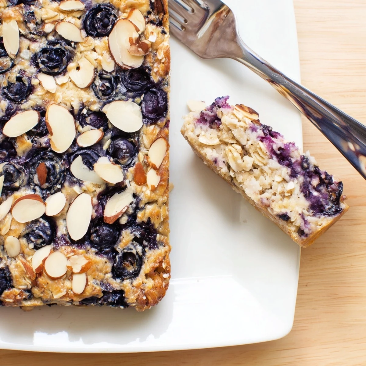 Golden blueberry cottage cheese breakfast bake with juicy berries bubbling on top