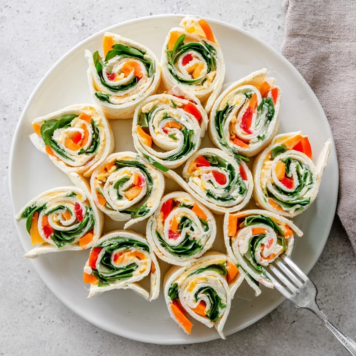 Creamy Pinwheel Sandwiches rolled in soft tortillas, ideal lunchbox or party snack