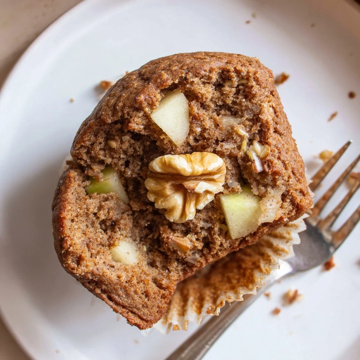 Healthy Apple Cinnamon Greek Yogurt Muffins drizzled with honey, served for breakfast or snack