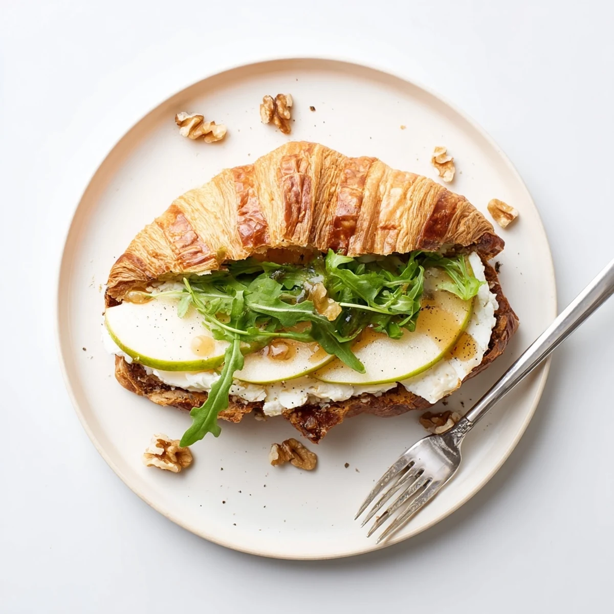 Rustic Apple Goat Cheese Croissant Sandwich with crisp apples and peppery arugula  